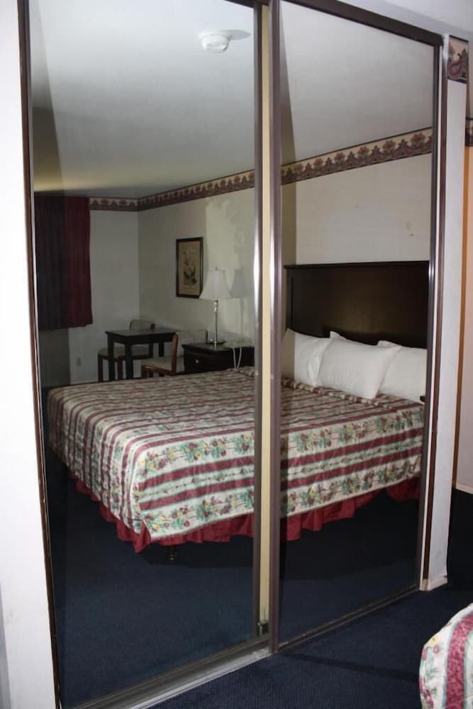 Garden Inn Suites 26/55
