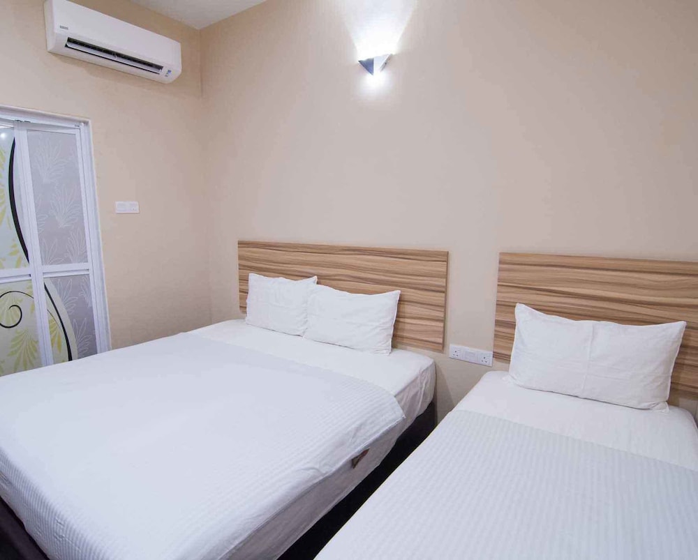 غرفة ثلاثية بسرير كينج وسرير فردي