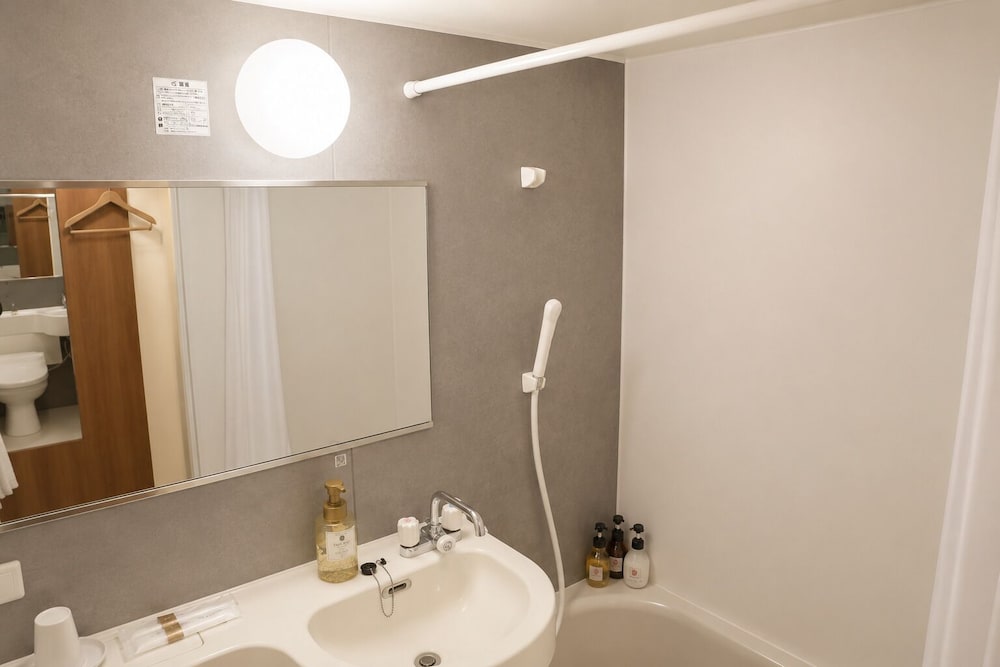 غرفة عائلية بسريرين منفصلين وسرير كينج، KANKU JOYTEL HOTEL 4/6