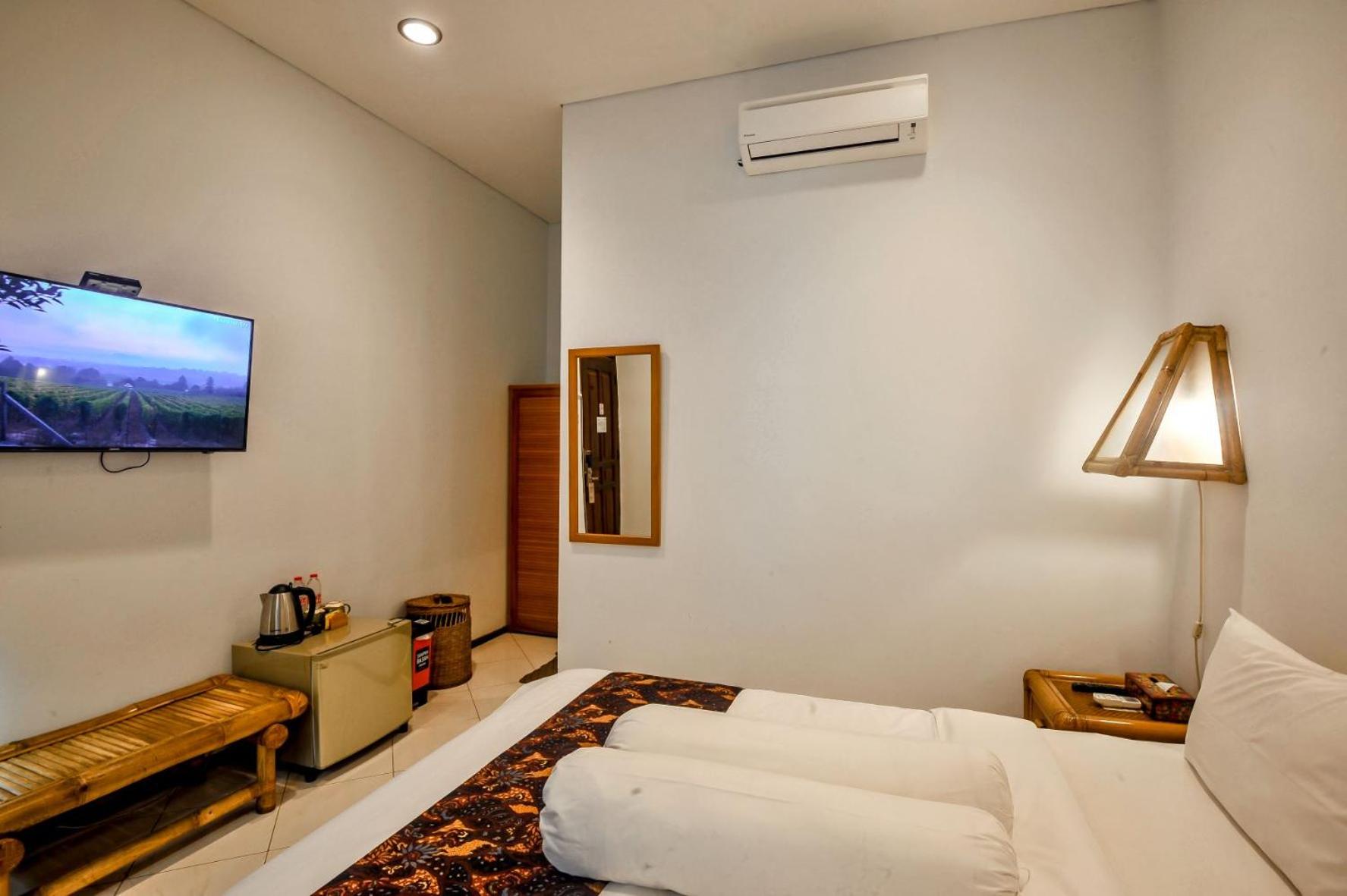 غرفة قياسية بسرير مزدوج، Rumah Mertua Heritage Yogyakarta 3/6