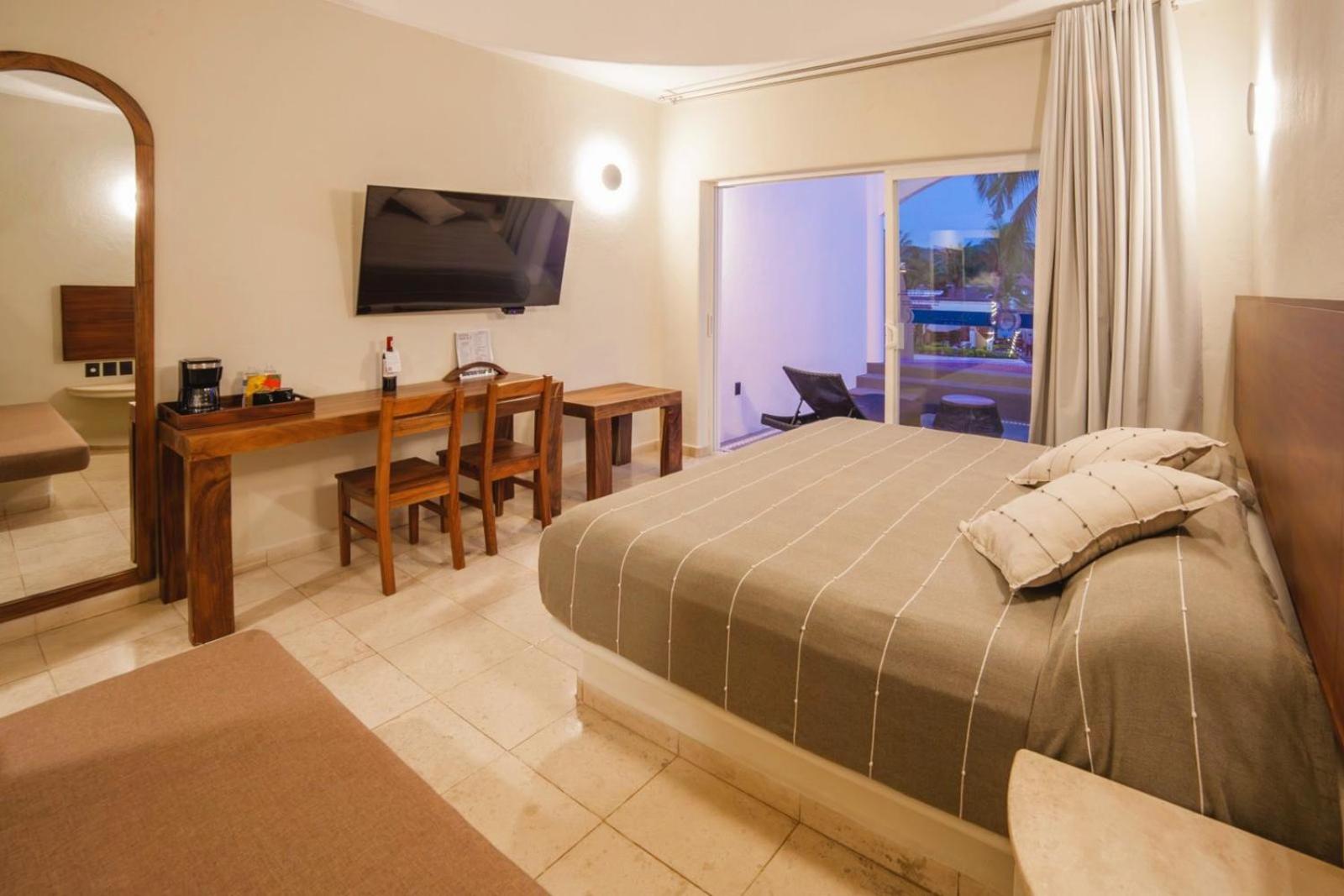 غرفة ديلوكس بسرير كينج بمسبح خاص، Quinta Bella Huatulco 3/7