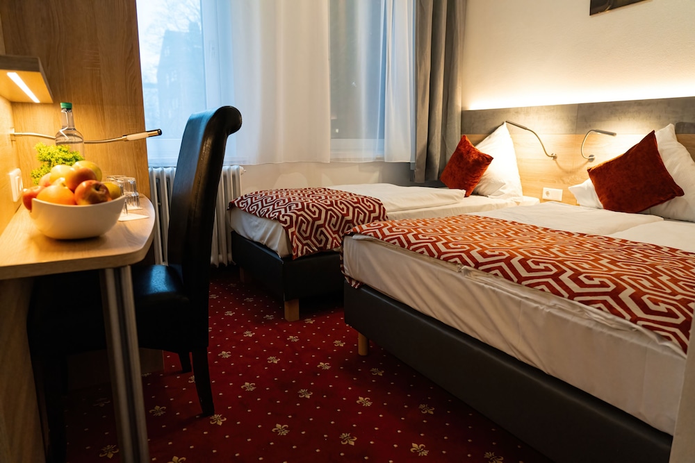 Comfort, Triple, 1 Double and 1 Single Bed