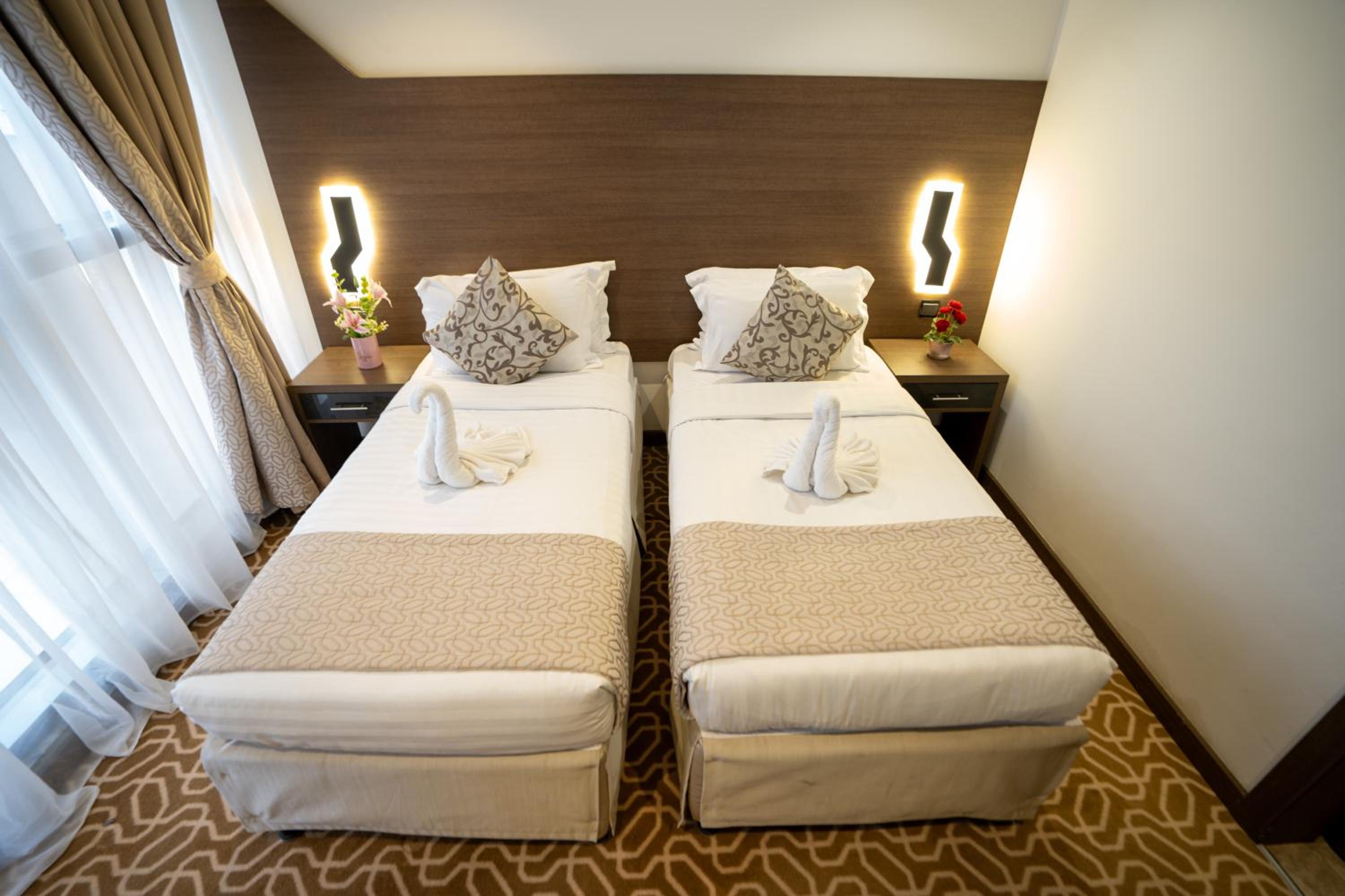 غرفة بسريرين منفصلين، فندق لمار اجياد الاول(Lamar Ajyad Hotel) 2/6
