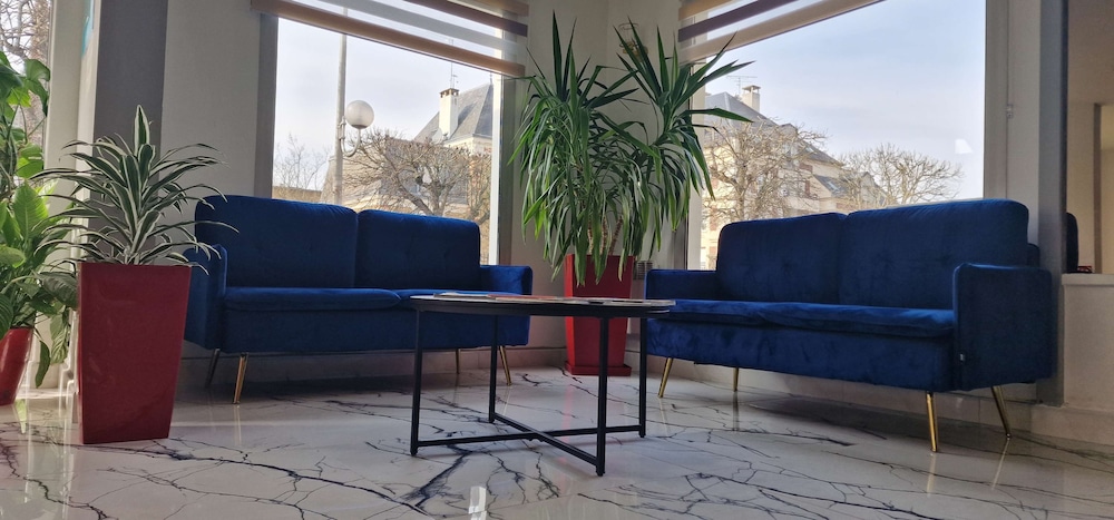 Kyriad Direct Arpajon 23/50