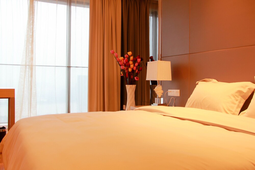Xingyi International Hotel Poly Store 18/70