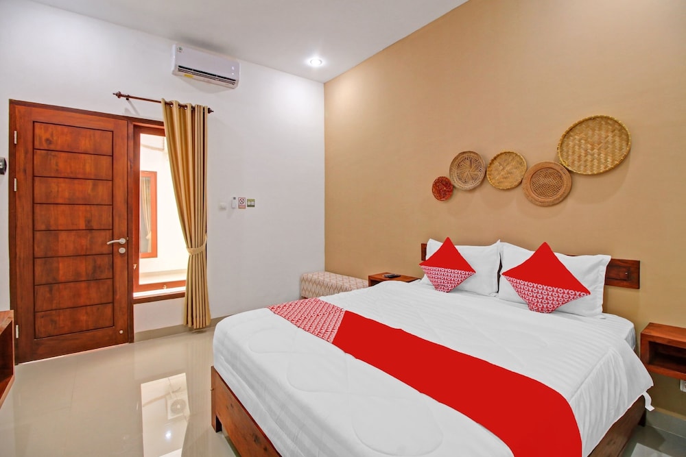 OYO 90820 Madania Guesthouse Syariah 13/23