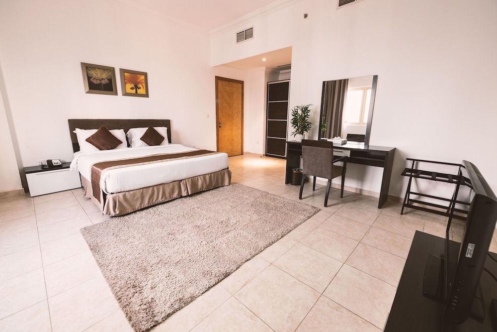 Magnum Hotel and Suites West Bay 12/54