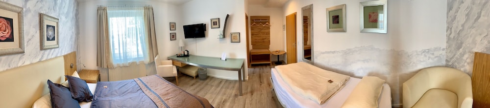 غرفة عائلية بسرير كينج وسرير فردي، Boutique Hotel Goldene Henne 6/7