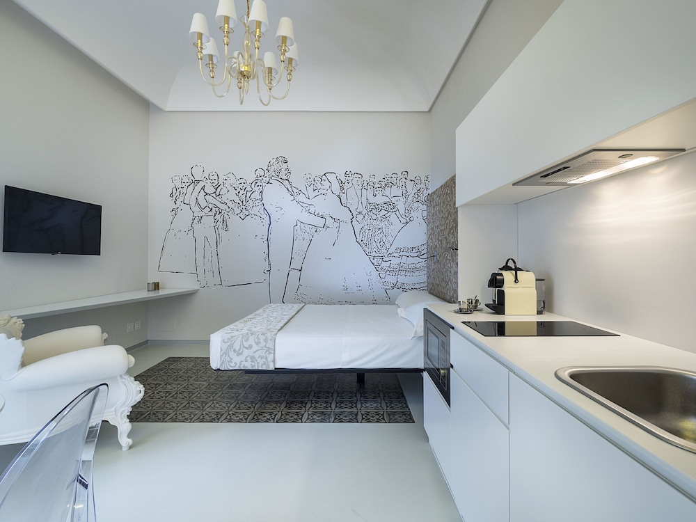 غرفة سوبيريور بسرير كوين، DUOMO SUITES & SPA 4/6