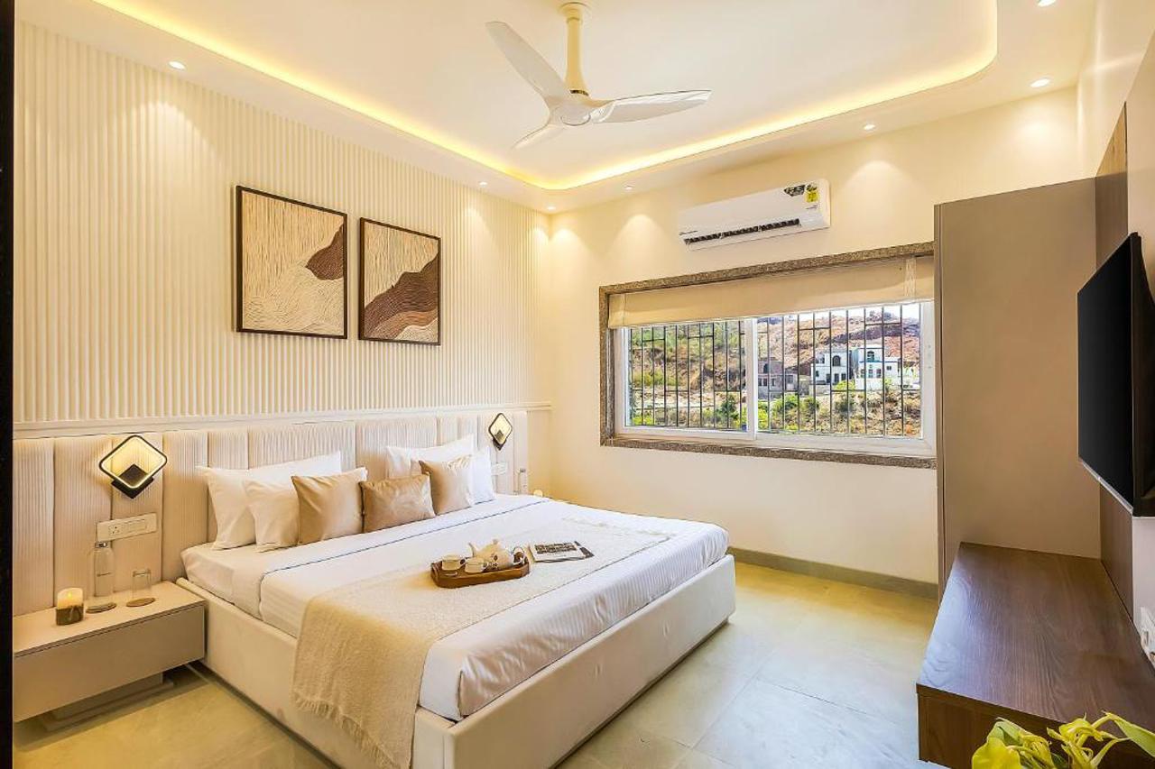 Room at ELIVAAS Shourya Viola 3 BHK Villa with Pvt Pool & Garden, UDAIPUR