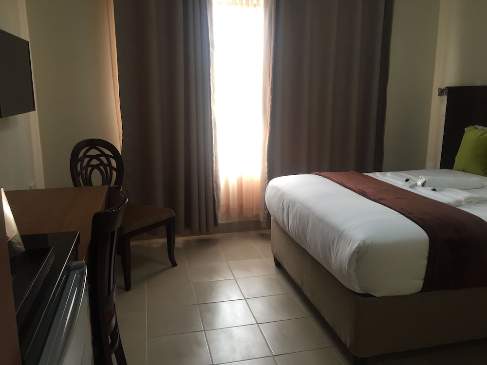 Cycad Palm Hotel 12/50