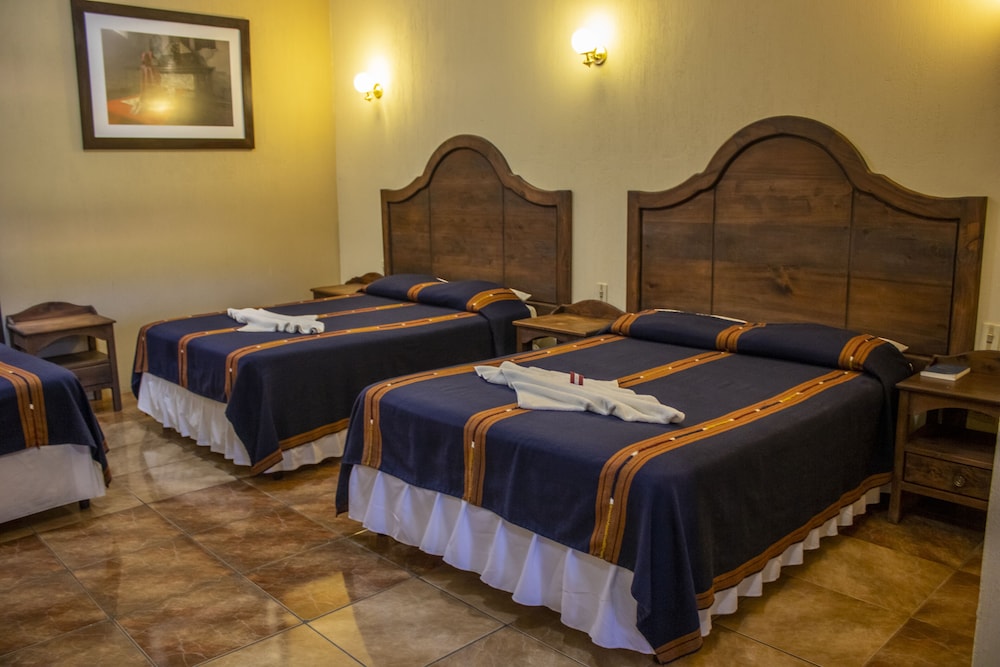 Standard, Triple, 1 Single and 2 Queen Beds