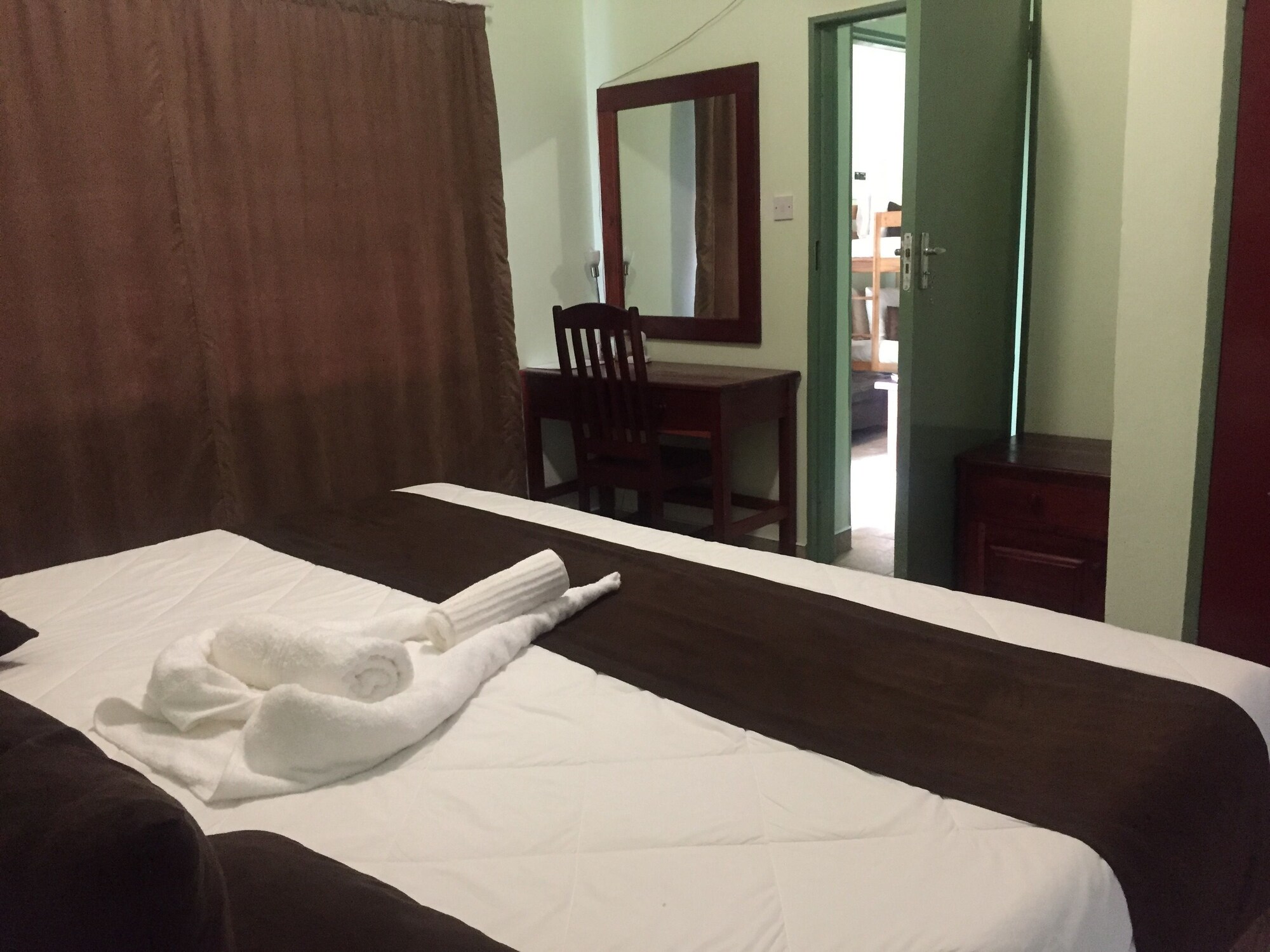 شقة بسريرين منفصلين بغرفة نوم واحدة، Masikiro Self-Catering Units 5/10