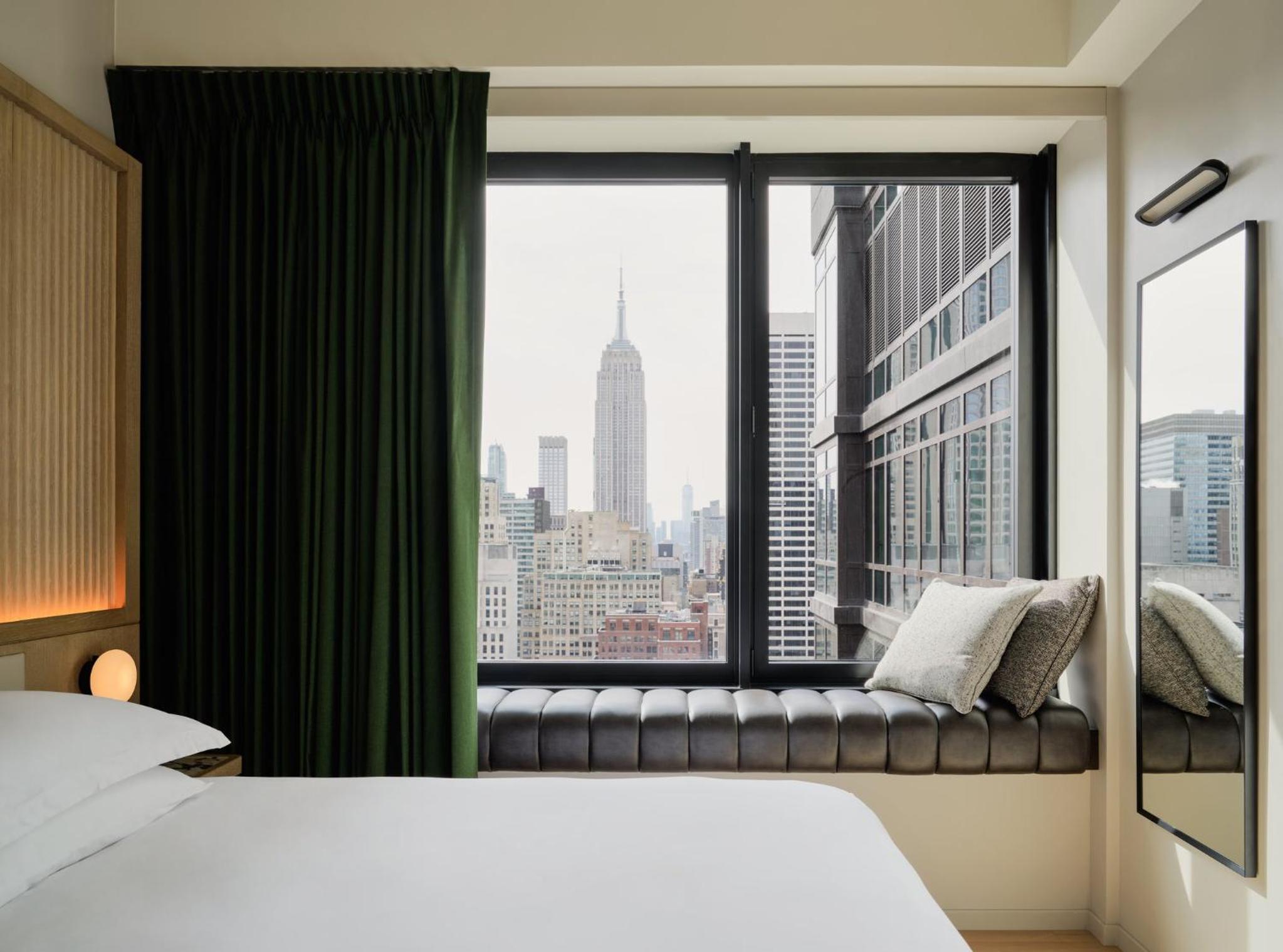 Essential, King Bed, Empire Building View