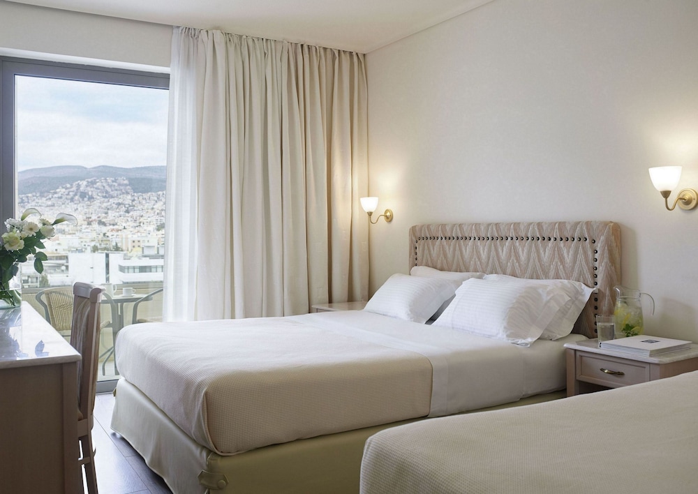 CLASSIC, DOUBLE BED, WITH EXTRA BED, SIDE SEA VIEW