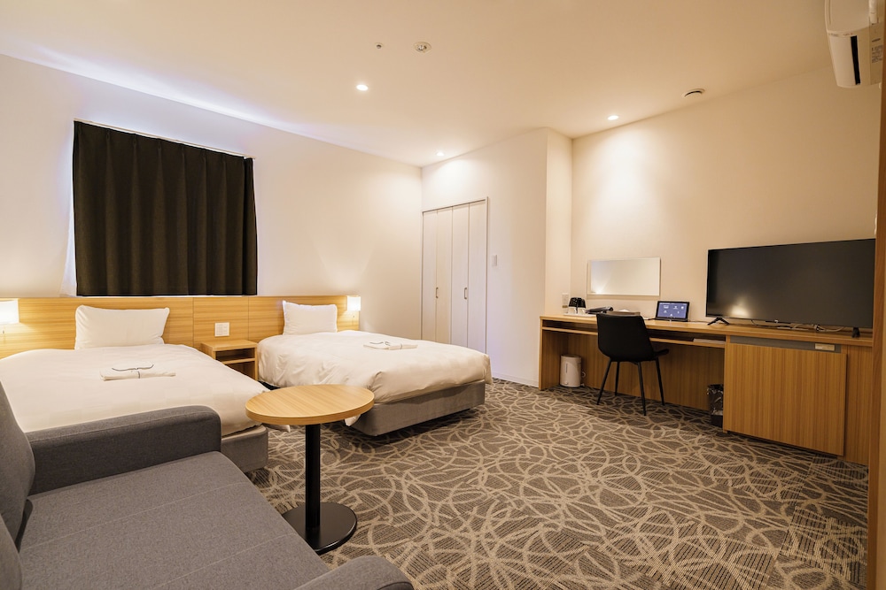 غرفة ديلوكس بسريرين منفصلين مع أريكة، Sakura Garden Hotel 6/10