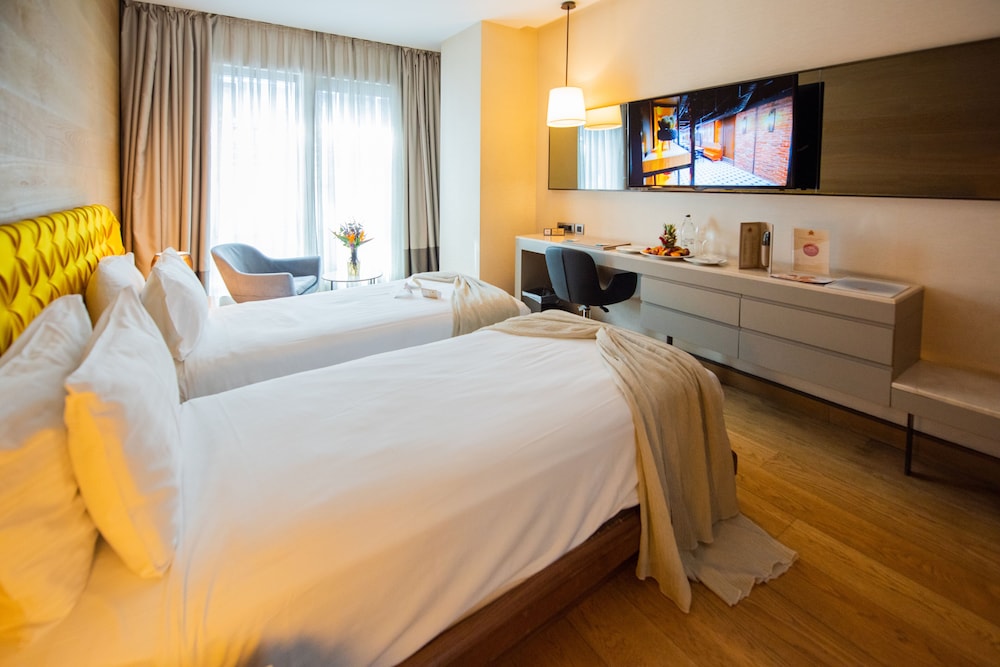 غرفة تنفيذية بسريرين منفصلين بإطلالة على المدينة بغرفة نوم واحدة، Dosso Dossi Hotels and SPA Downtown 2/10