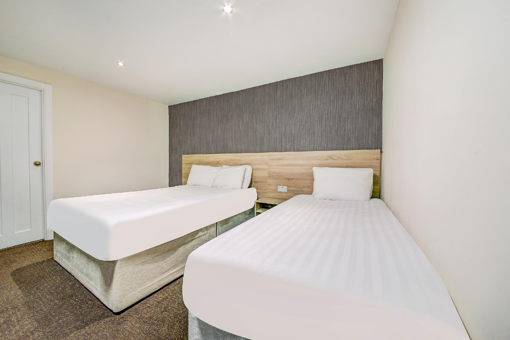 Deluxe Quad Room