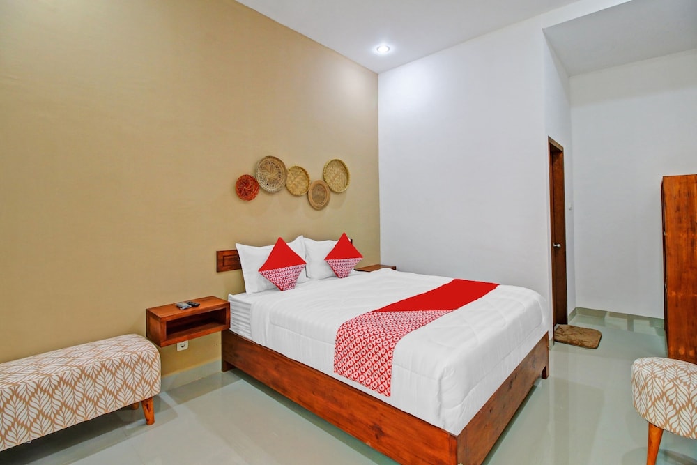 OYO 90820 Madania Guesthouse Syariah 16/23