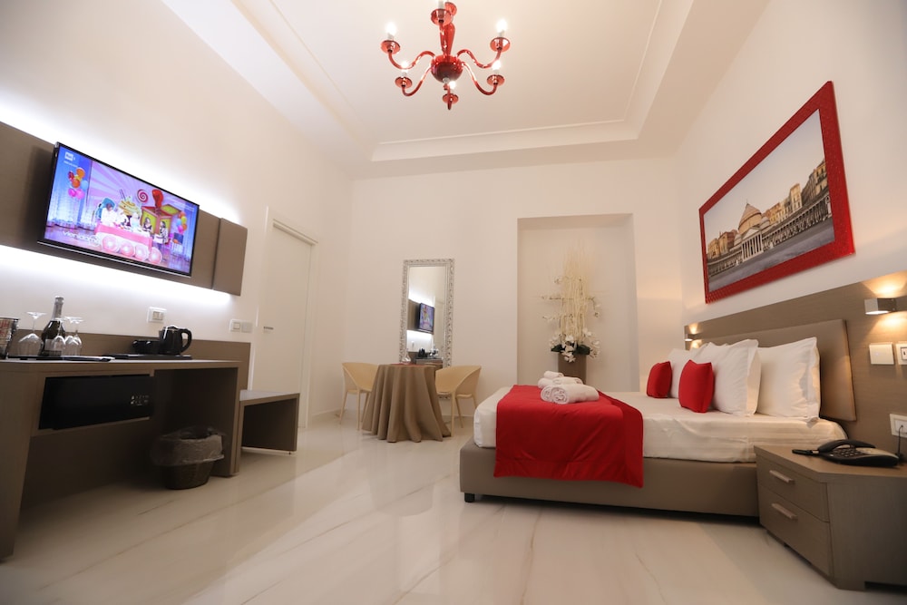 جناح فاخر بسرير كينج مع أريكة بحوض جاكوزي