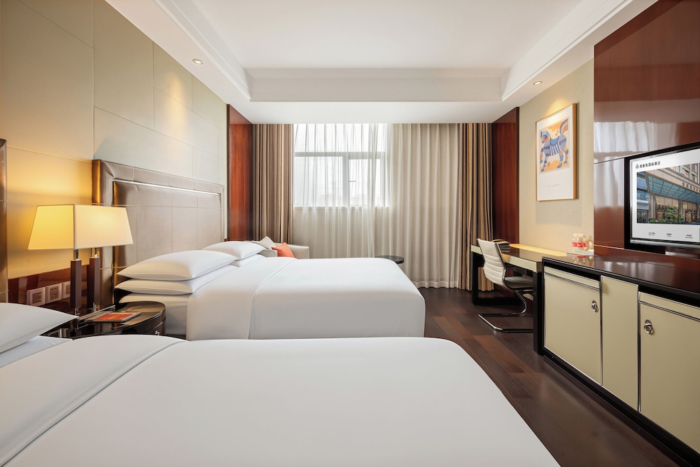 غرفة سوبيريور ثلاثية بسرير كوين وسرير فردي، Maixinge International Hotel 5/8