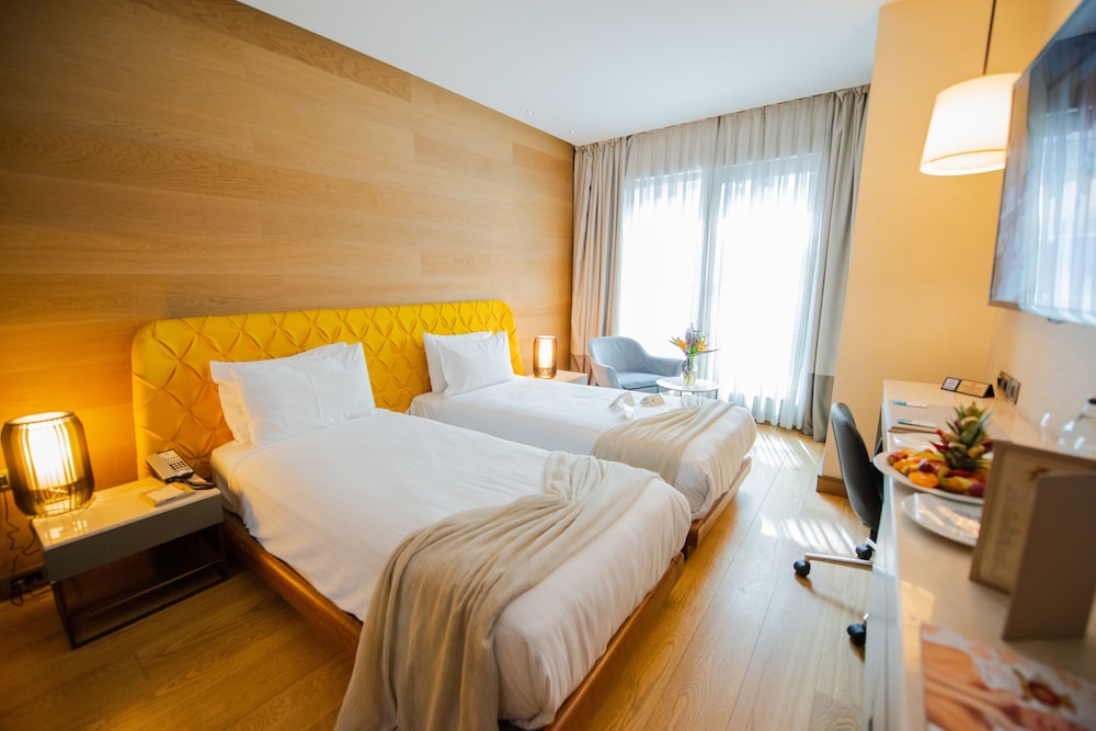 غرفة تنفيذية بسريرين منفصلين بإطلالة على المدينة بغرفة نوم واحدة، Dosso Dossi Hotels and SPA Downtown 4/10