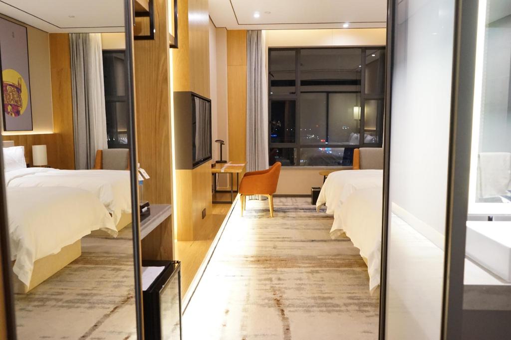 Rezen Longuu Hotel (Zhaoqing Qixingyan scenic spot store) 12/48