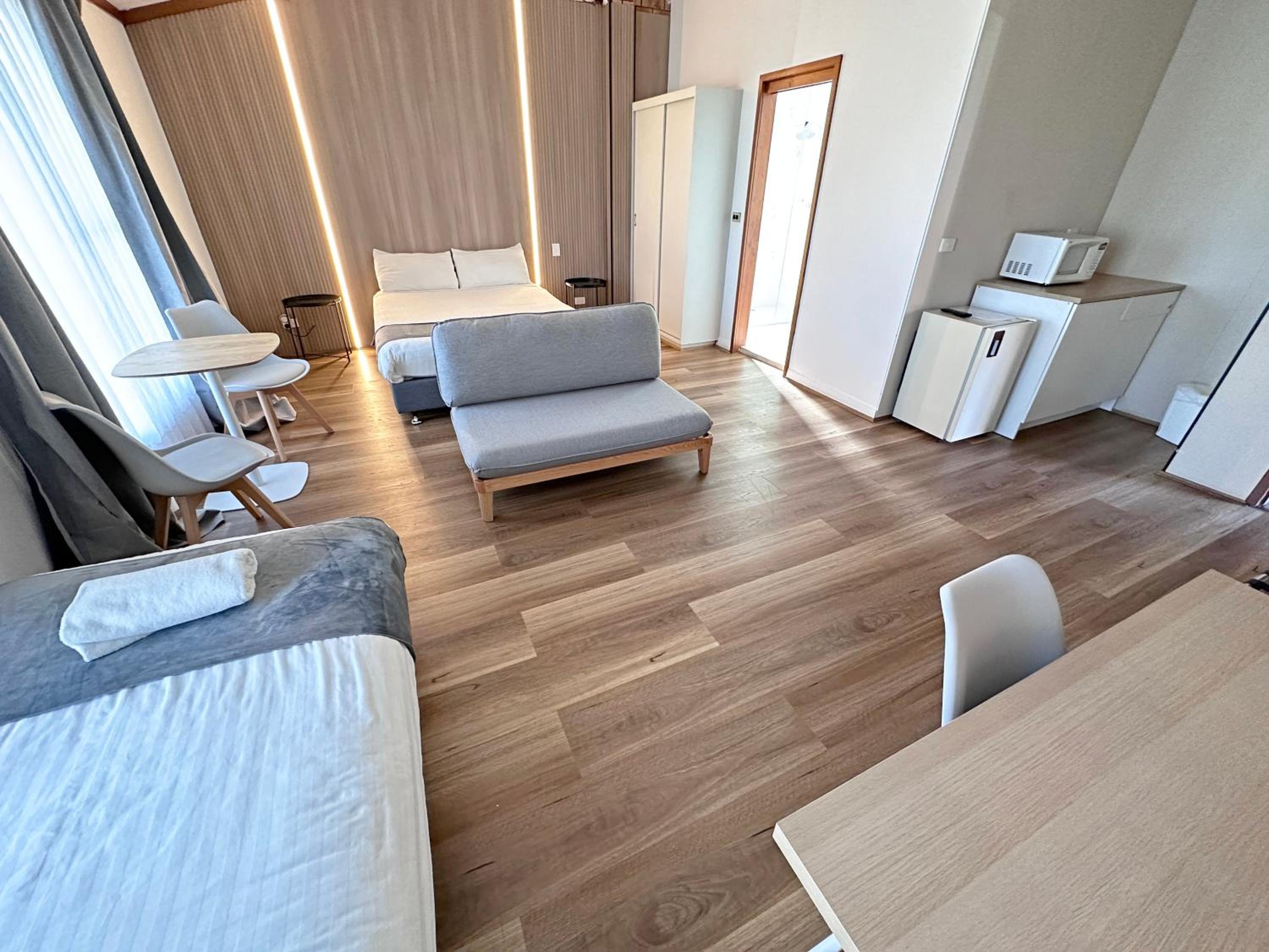 Deluxe, 1 Double and 1 Single Bed