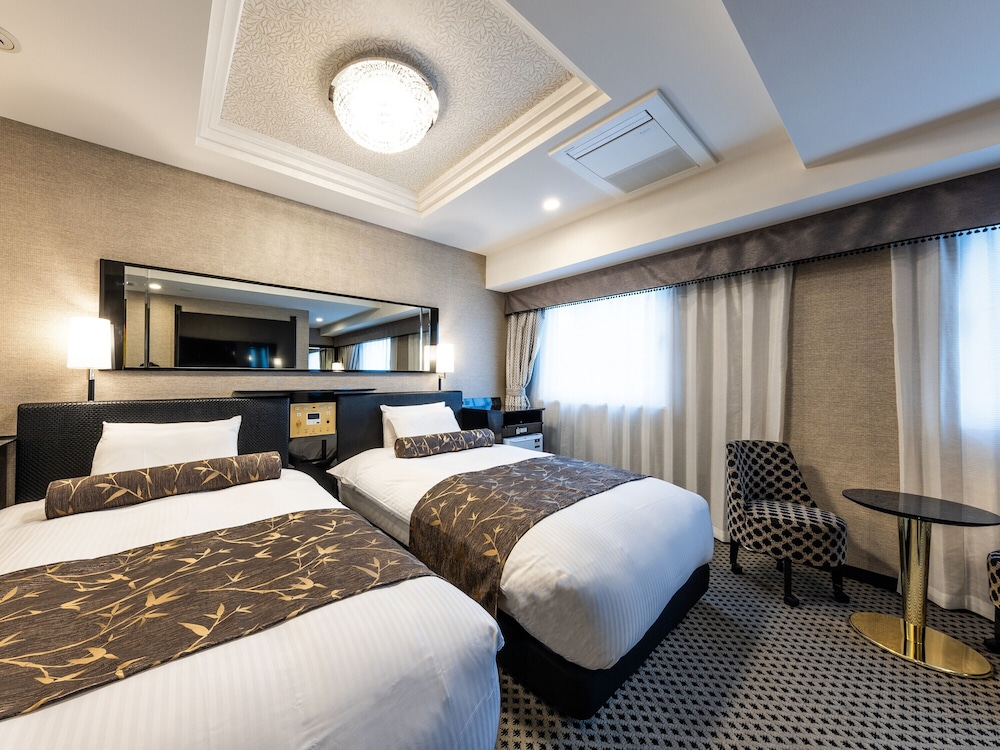 DELUXE, TWIN BEDS