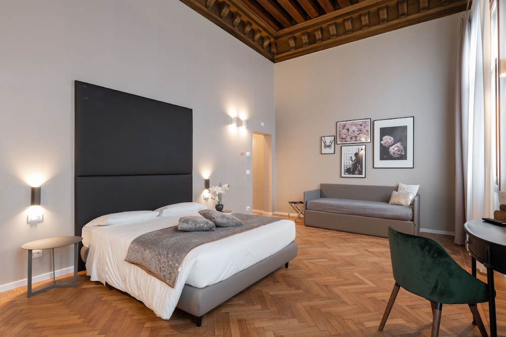جناح جونيور ديلوكس بسرير كينج بإطلالة على القناة مع أريكة، Hotel Palazzo Martinelli Dolfin 4/10
