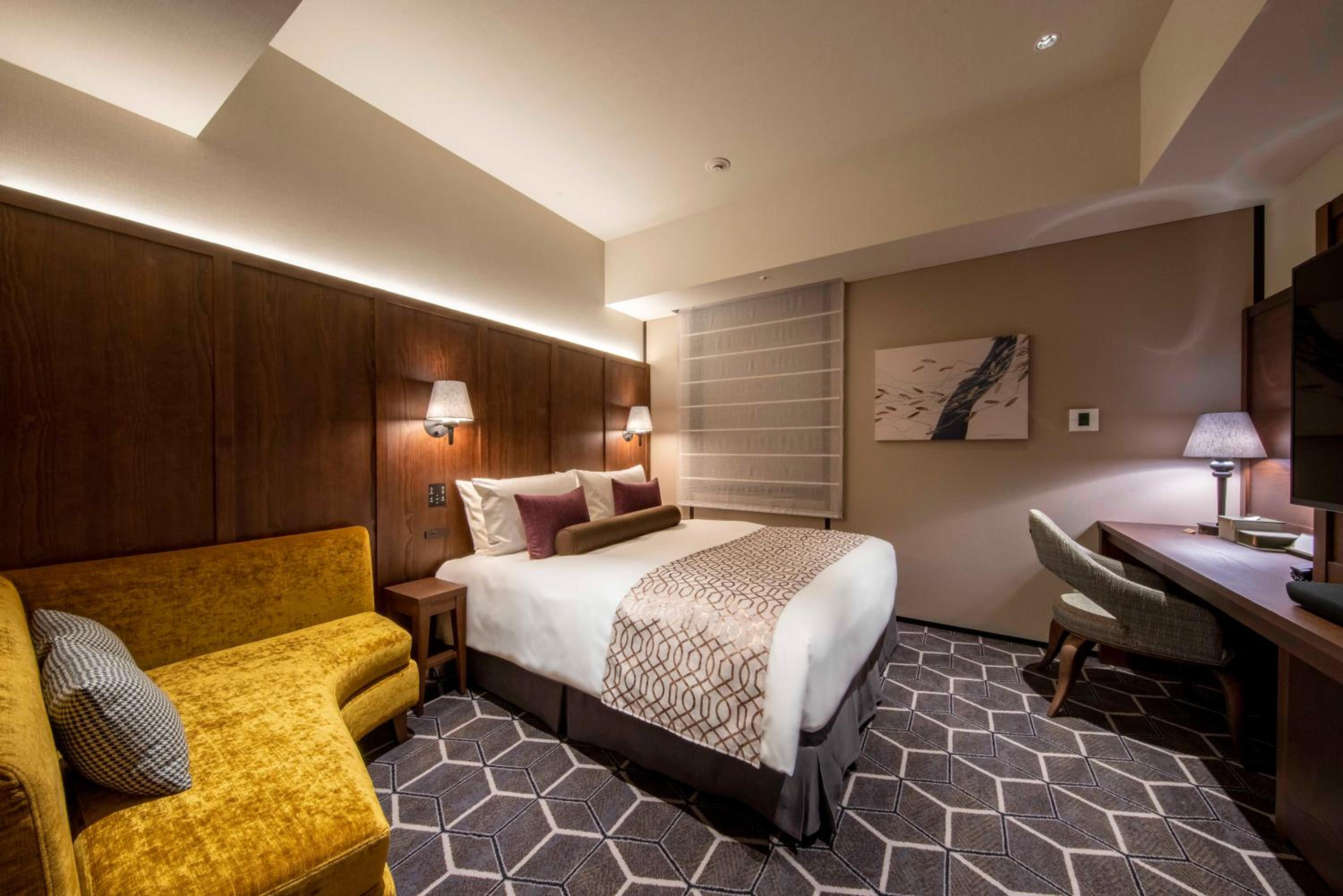 غرفة تنفيذية بسرير كوين وسرير مزدوج