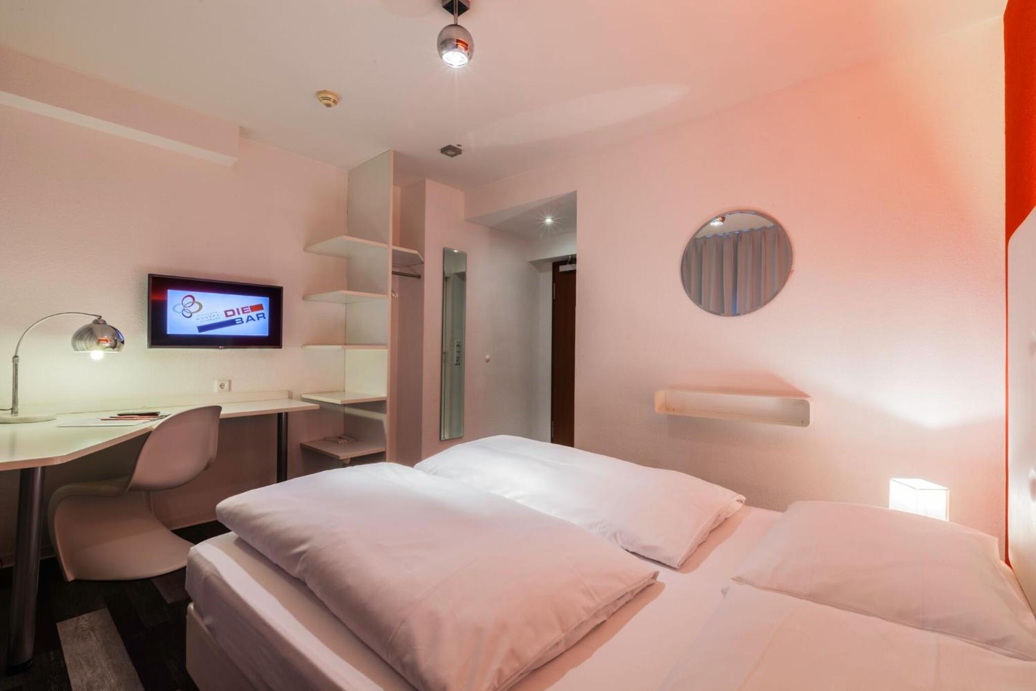 غرفة بسرير مزدوج أو سريرين منفصلين، Cityhotel Monopol 2/7