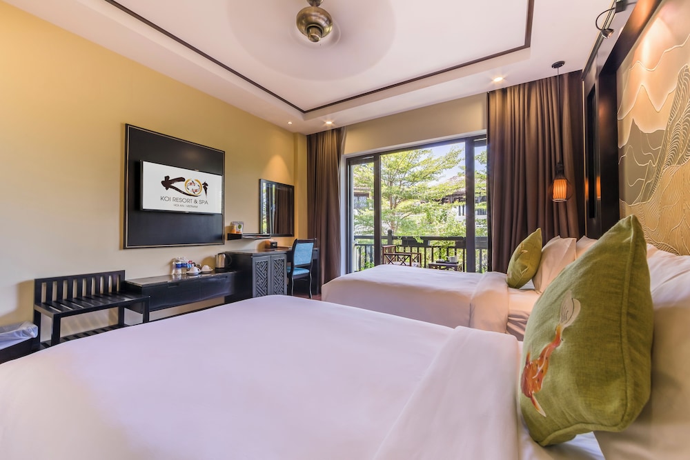 غرفة سوبيريور مزدوجة بسريرين منفصلين بإطلالة على الحديقة، Koi Resort Spa Hoi An 3/10