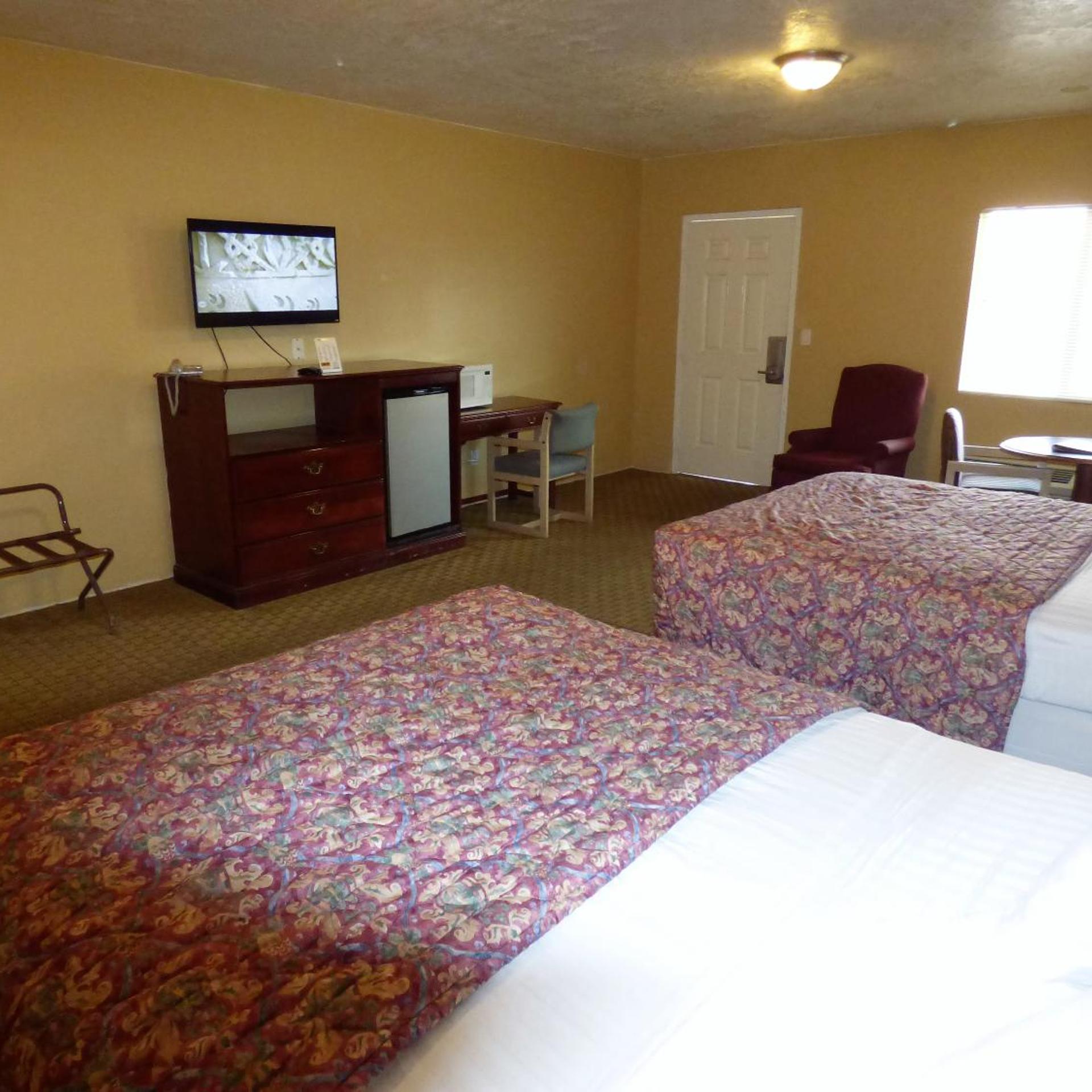 Economy Inn Suites 17/23