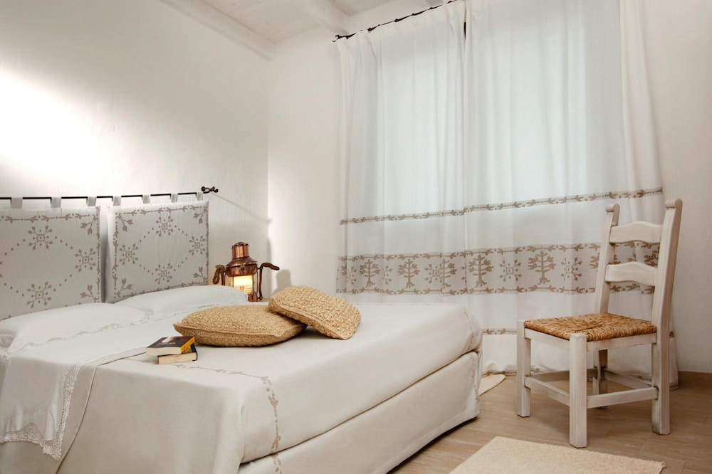 Residence Punta Falcone 20/50