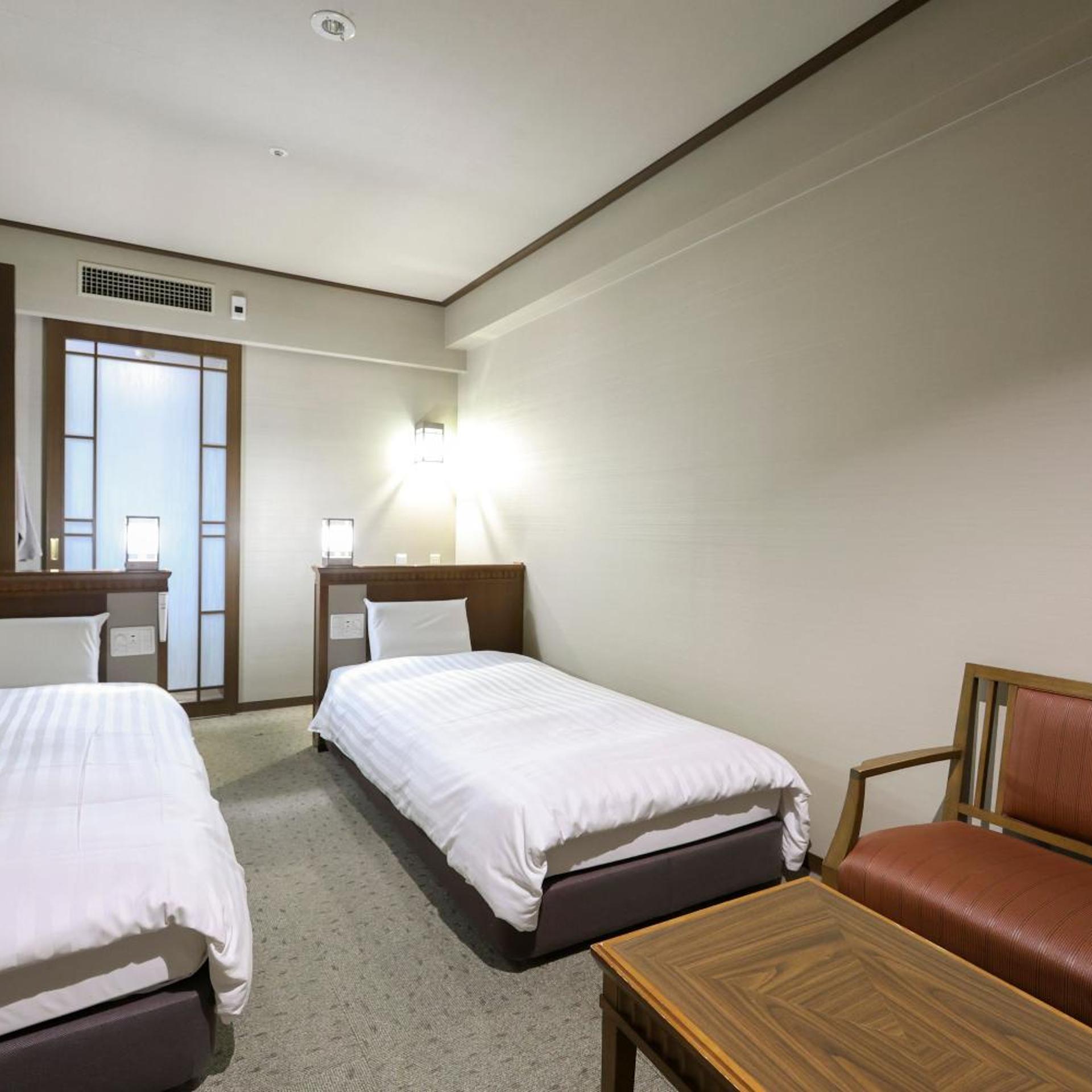 غرفة بسريرين منفصلين، Dormy Inn Premium Otaru 3/9