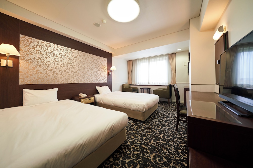 غرفة بسريرين منفصلين بإطلالة على النهر في الملحق، Hotel Global View Kushiro 3/5