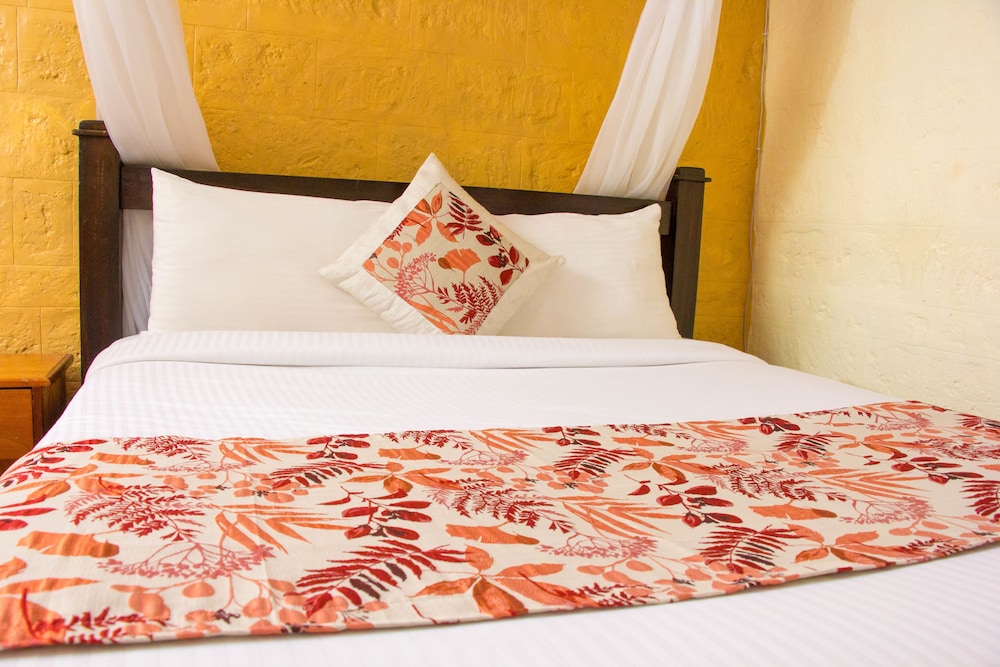 Karen Inn and Suites 24/50