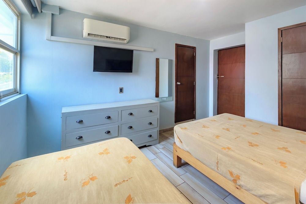Standard, Triple, Multiple Beds، Capital O Hotel Colon Express Guadalajara 2/6