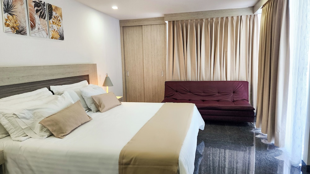 غرفة سوبيريور بسرير كينج مع أريكة، Hotel BE Suites Cali 3/10