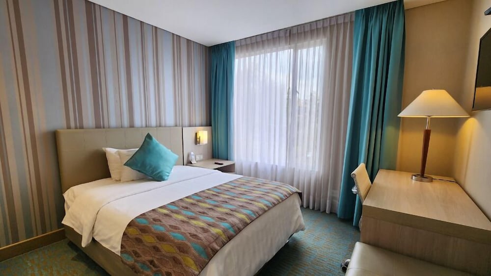 Hotel Plaza Suites 23/65