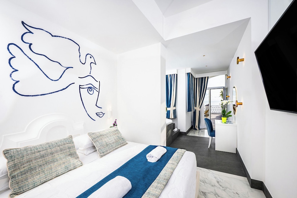 غرفة جونيور بسرير مزدوج وسريرين منفصلين، Positano Art Hotel Pasitea 6/10