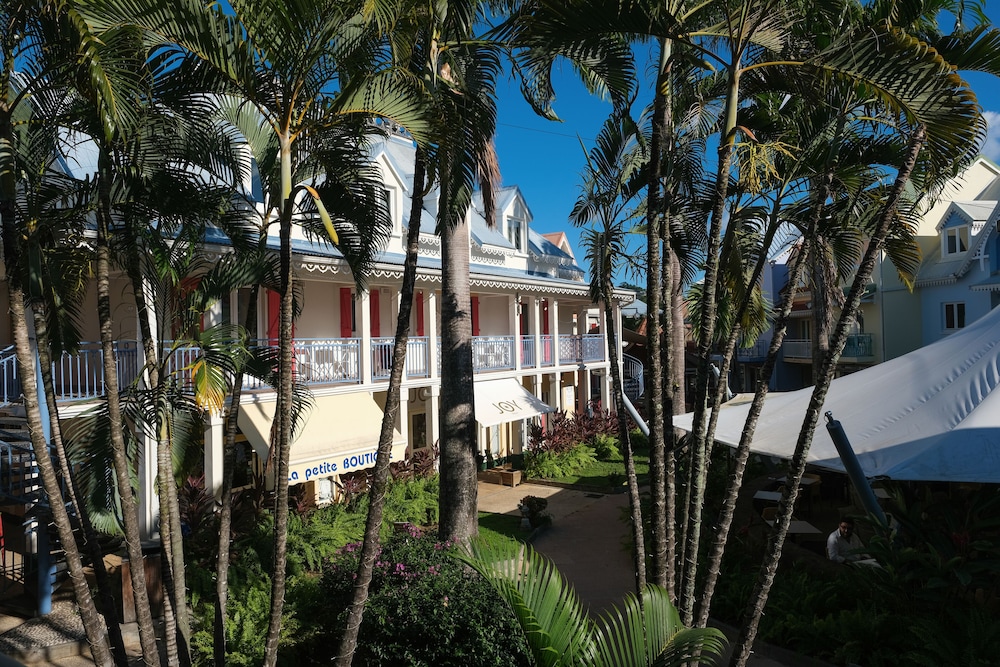 Village Creole 30/34