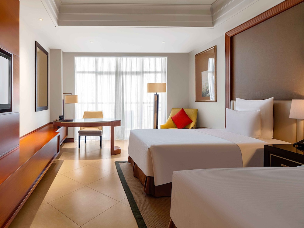 غرفة تنفيذية بسريرين منفصلين بإطلالة على النهر بشرفة، Pullman Haikou 2/3