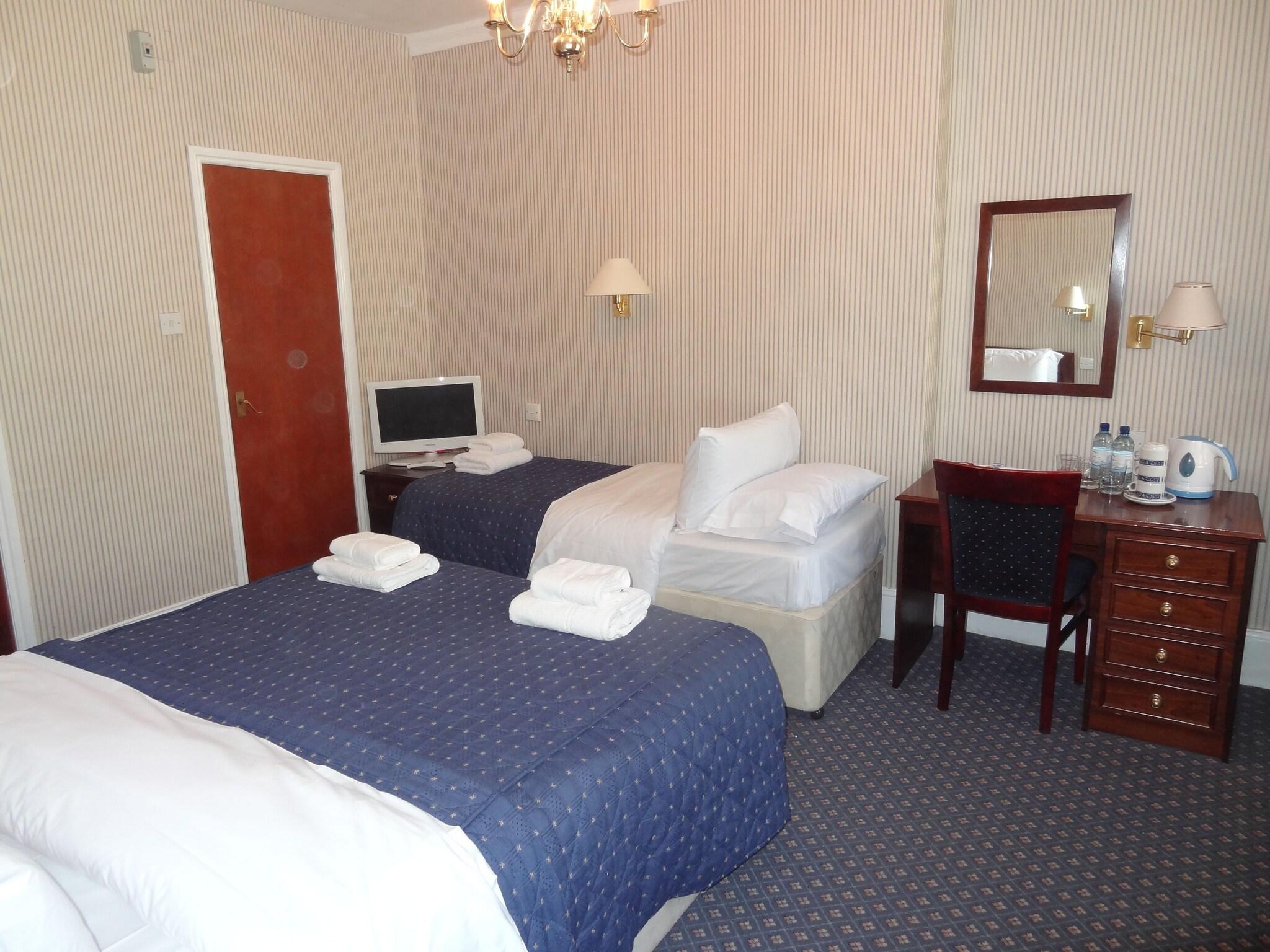 غرفة عائلية بسريرين، Regency House 2/5