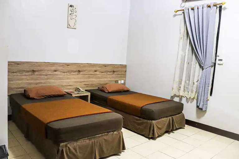 Hotel Pesona Enasa Merak 5/11