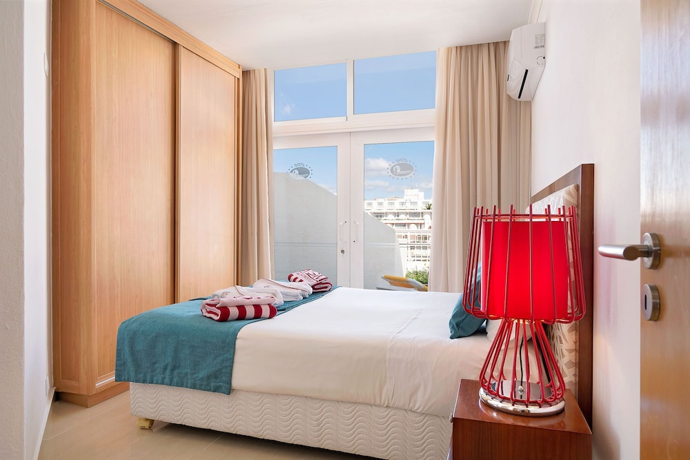 شقة سوبيريور بسرير مزدوج بإطلالة على الحديقة بغرفة نوم واحدة مع أريكة، Muthu Clube Praia Da Oura 4/7