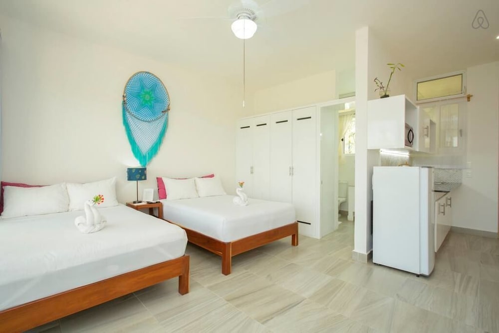 جناح فاخر اقتصادي تنفيذي بسريرين مزدوجين مع أريكة، Ocean Zen Suites 3/8