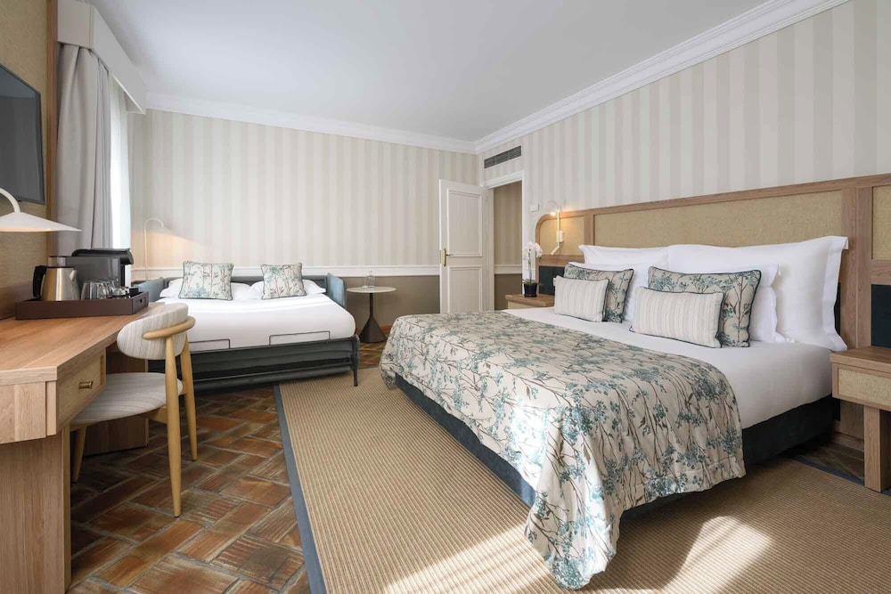 غرفة ديلوكس بسرير مزدوج وسرير فردي بإطلالة على الحديقة، Hotel Da Cartuxa 2/4