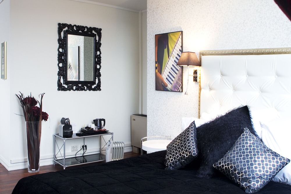 Home Hotel Grand Olav 13/37